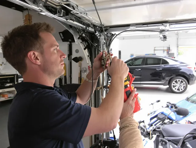 Glendale Garage Door Repair safety certified technician performing cable replacement in Glendale